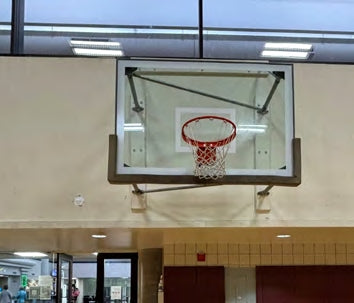 Innovation in Athlete Safety: How Bison Revolutionized Backboard Padding Standards in Basketball